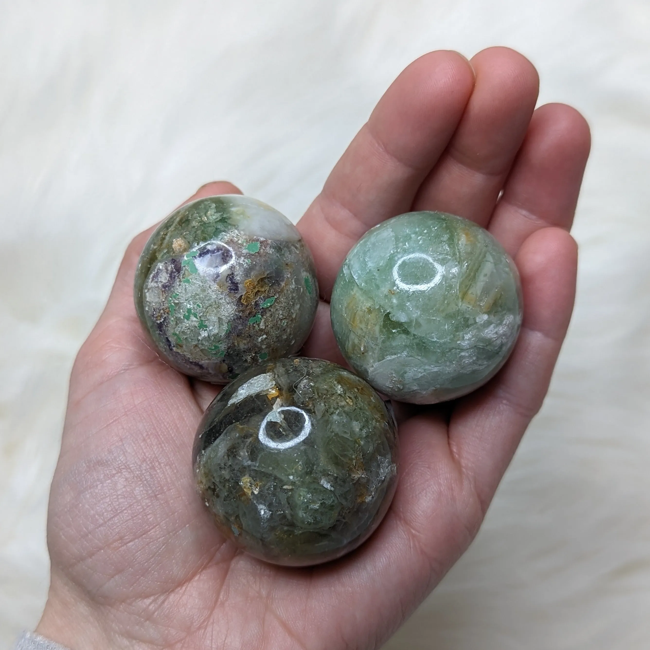 One Earthy Green Flourite Sphere